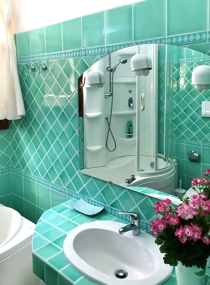 bathroom with tub and shower